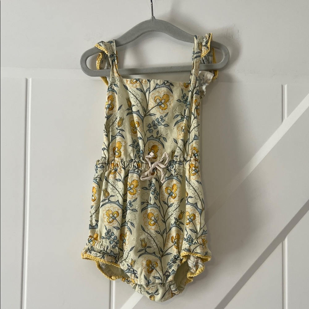 Yellow baby girl ruffle romper